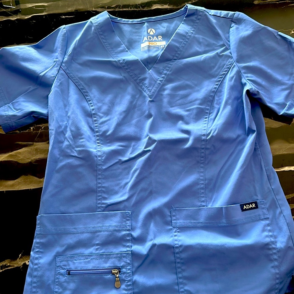 Adar pro XS blue worn just a few times. V neck